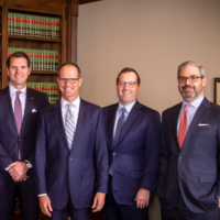 Shot of four attorneys at Buzzell, Welsh & Hill - Hill, Welsh, Carroll, and Ethridge